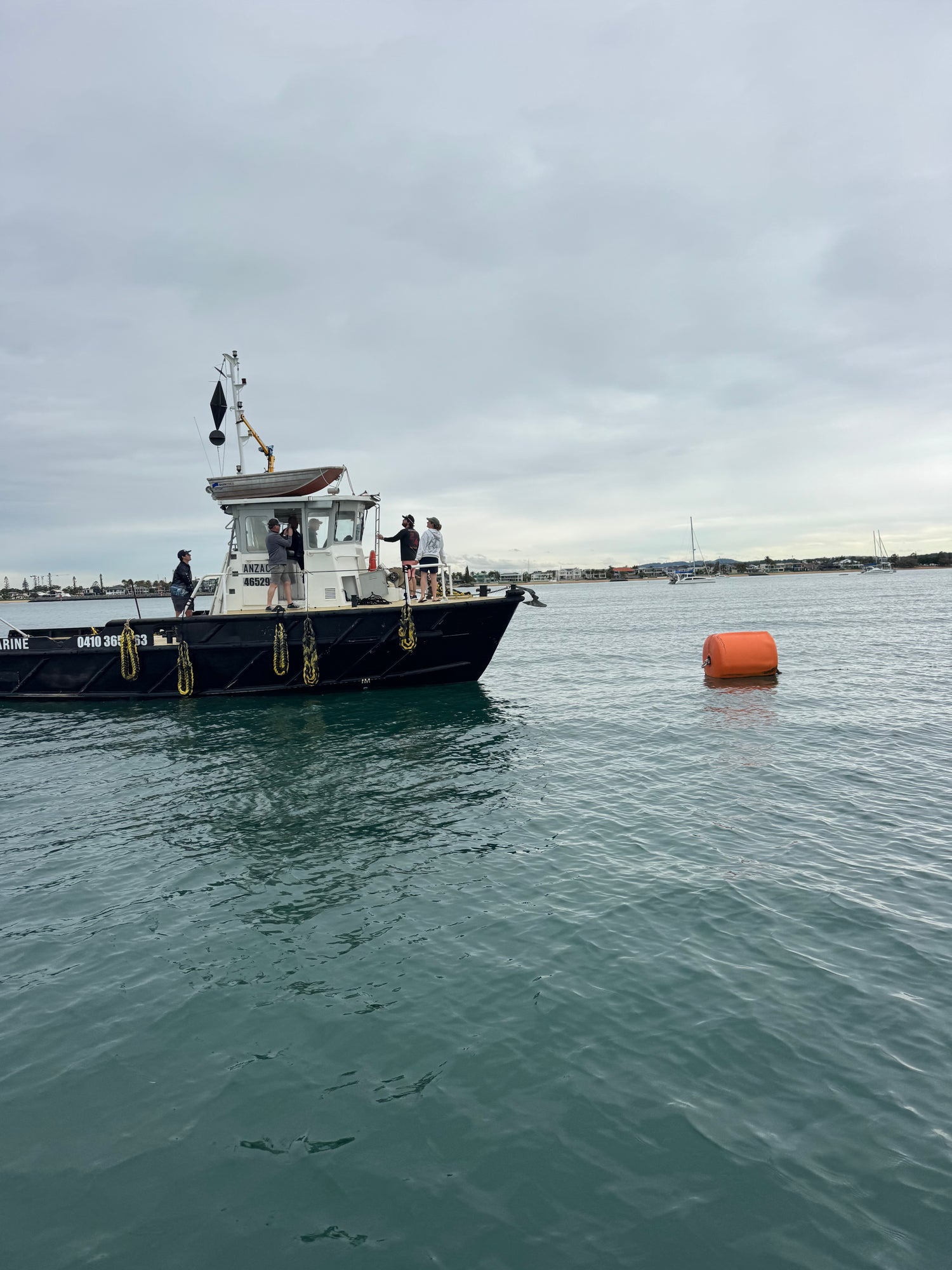 Boat Coach commercial training vessel with students on deck at Cleveland, Queensland